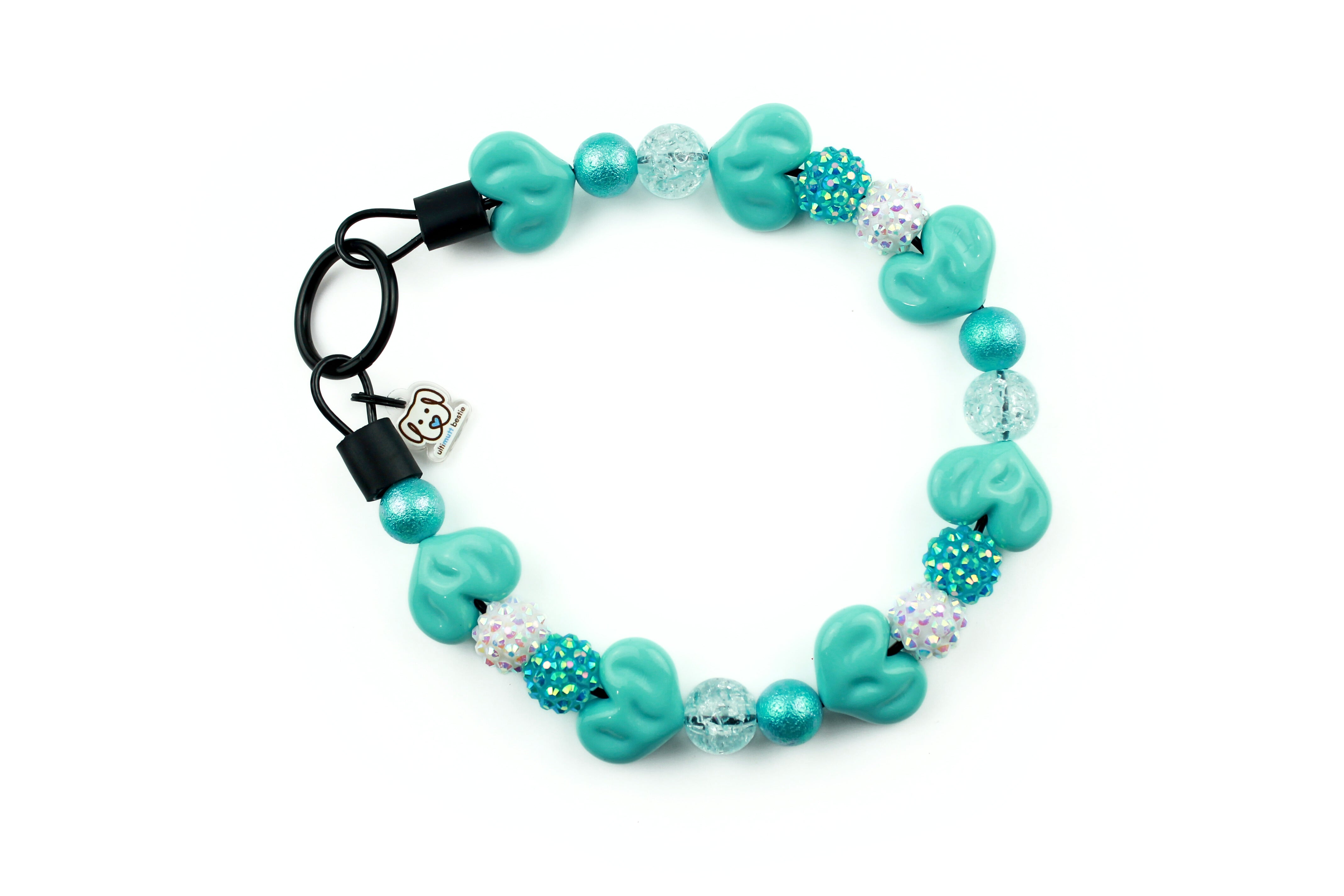 slip on dog collar with 12 - 24MM small acrylic beaded collar featuring 14mm small white and aqua rhinestones, 14MM blue crackle, 12MM blue crinkle, and 24mm x 18MM blue heart beads can be paired with square 10MM acrylic letter beads.