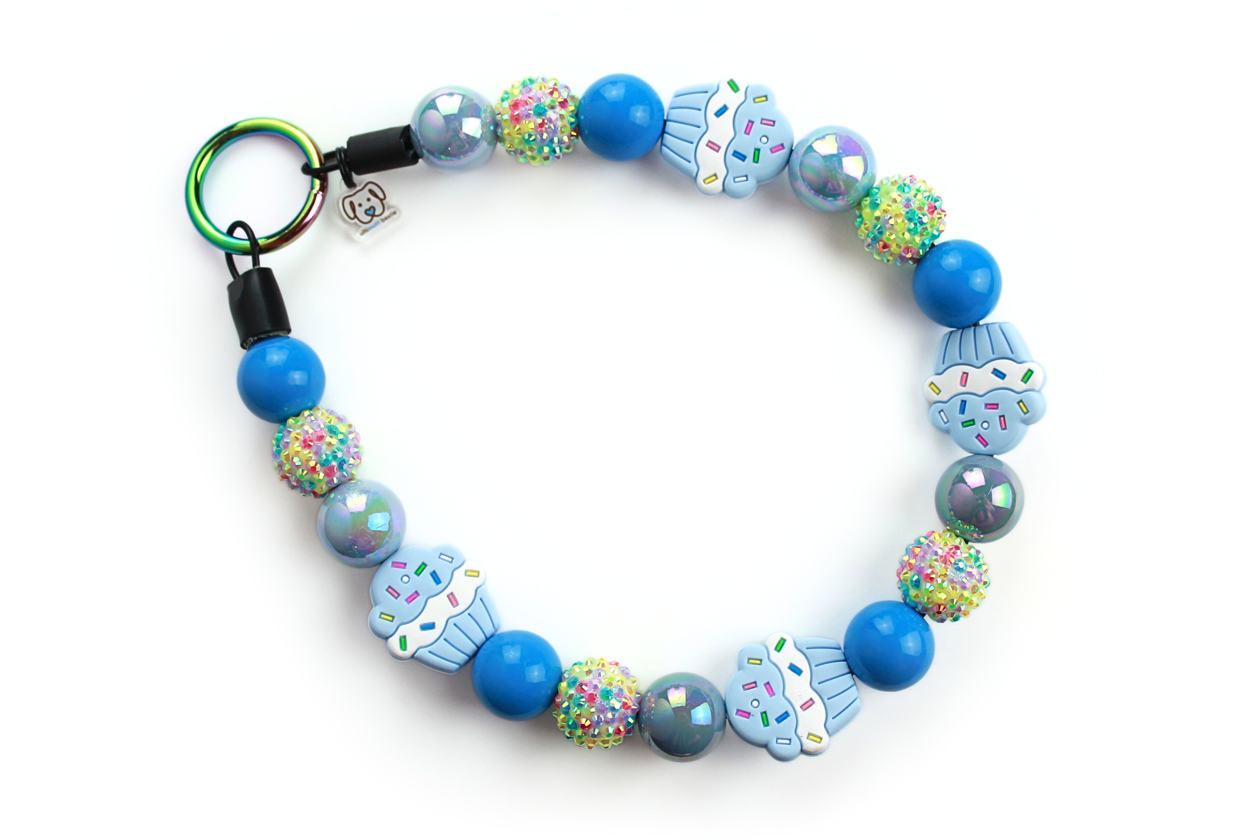 Large beaded dog collar, birthday, celebration and gotcha day collar for boy dog, bright blue, blue miracle, multi-color confetti rhinestones and large blue cupcake silicone focal beads, can be personalized with cube acrylic white letter beads