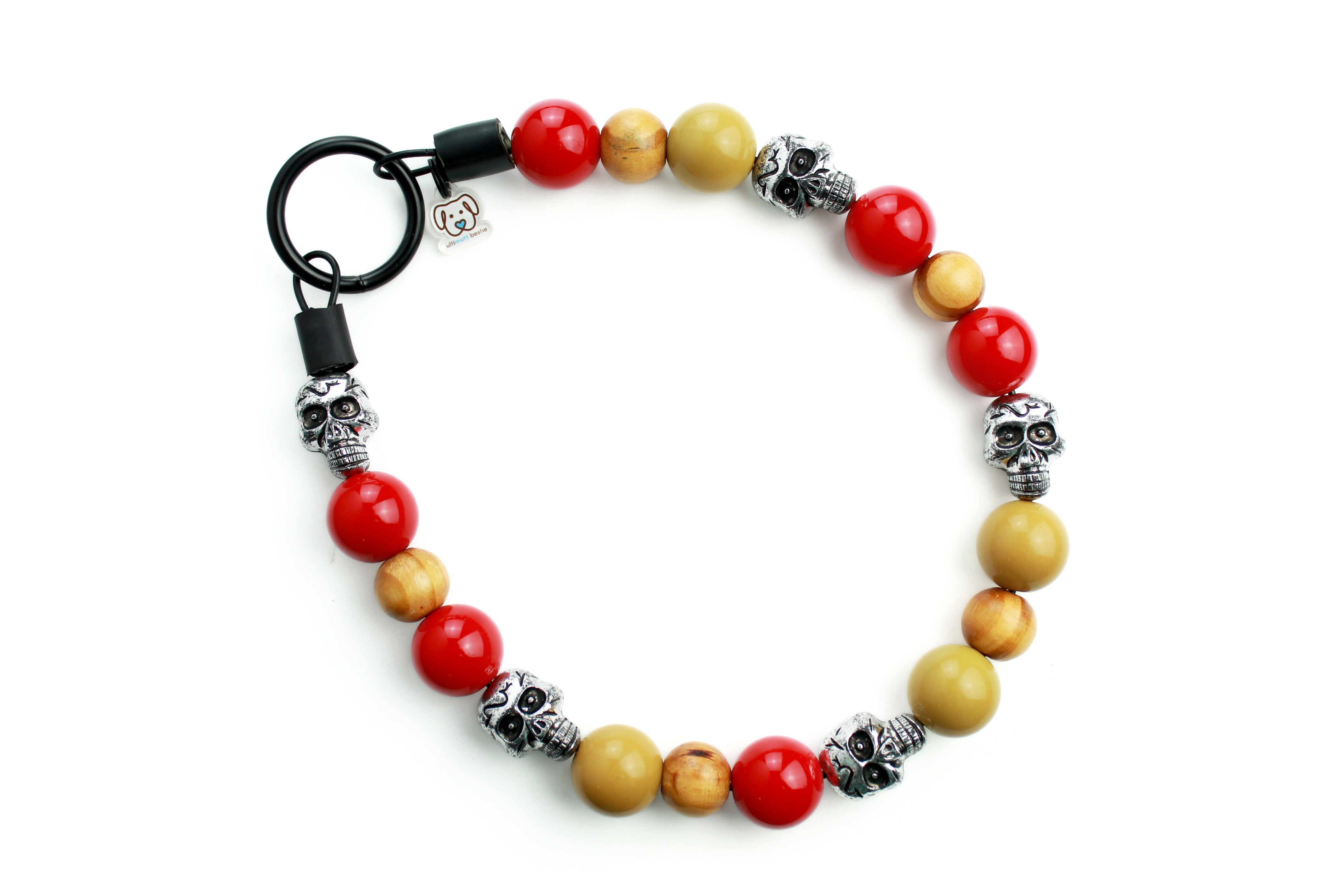 Boneyard Blitz collar with silver antique skulls, red and lite olive solid accompanied with wood beads closure is a black welded O'ring