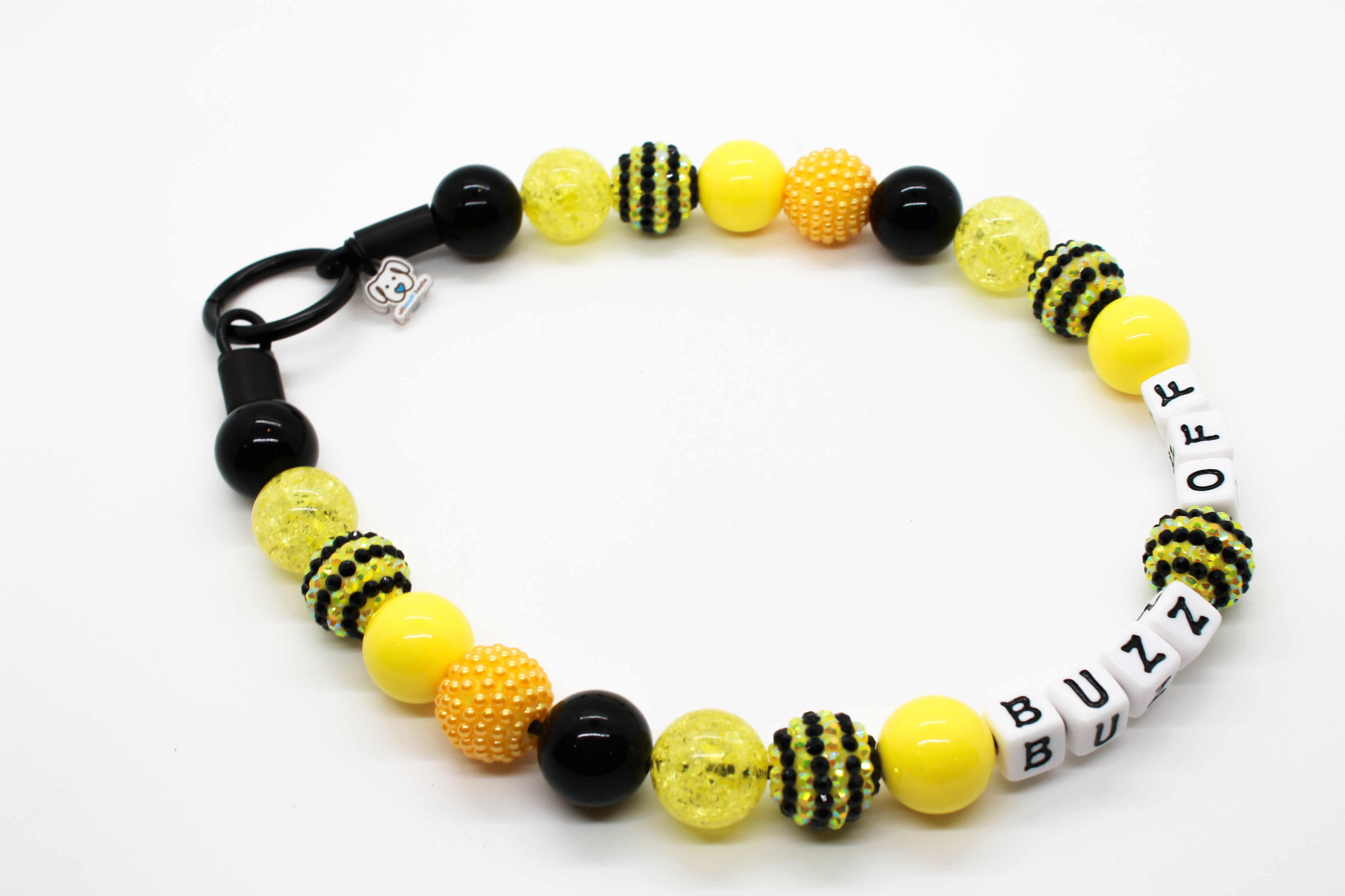 Bee themed bead dog collar, beaded with yellow and black acrylic, resin and rhinestone beads, personalized with white acrylic letter with black font.