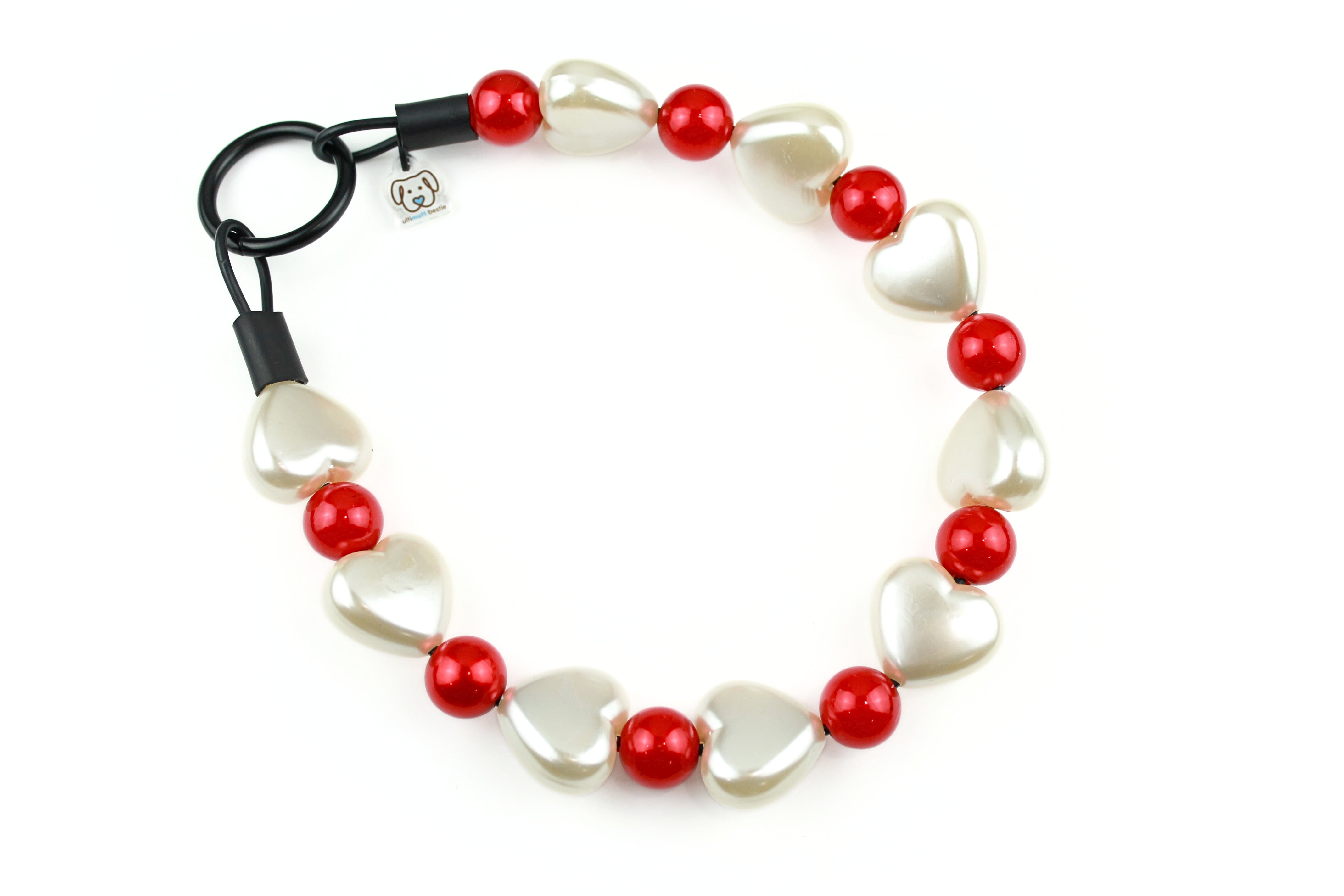 Acrylic large cream pearl puffy hearts and red small pearl dog collar with black o-ring. Slip on style