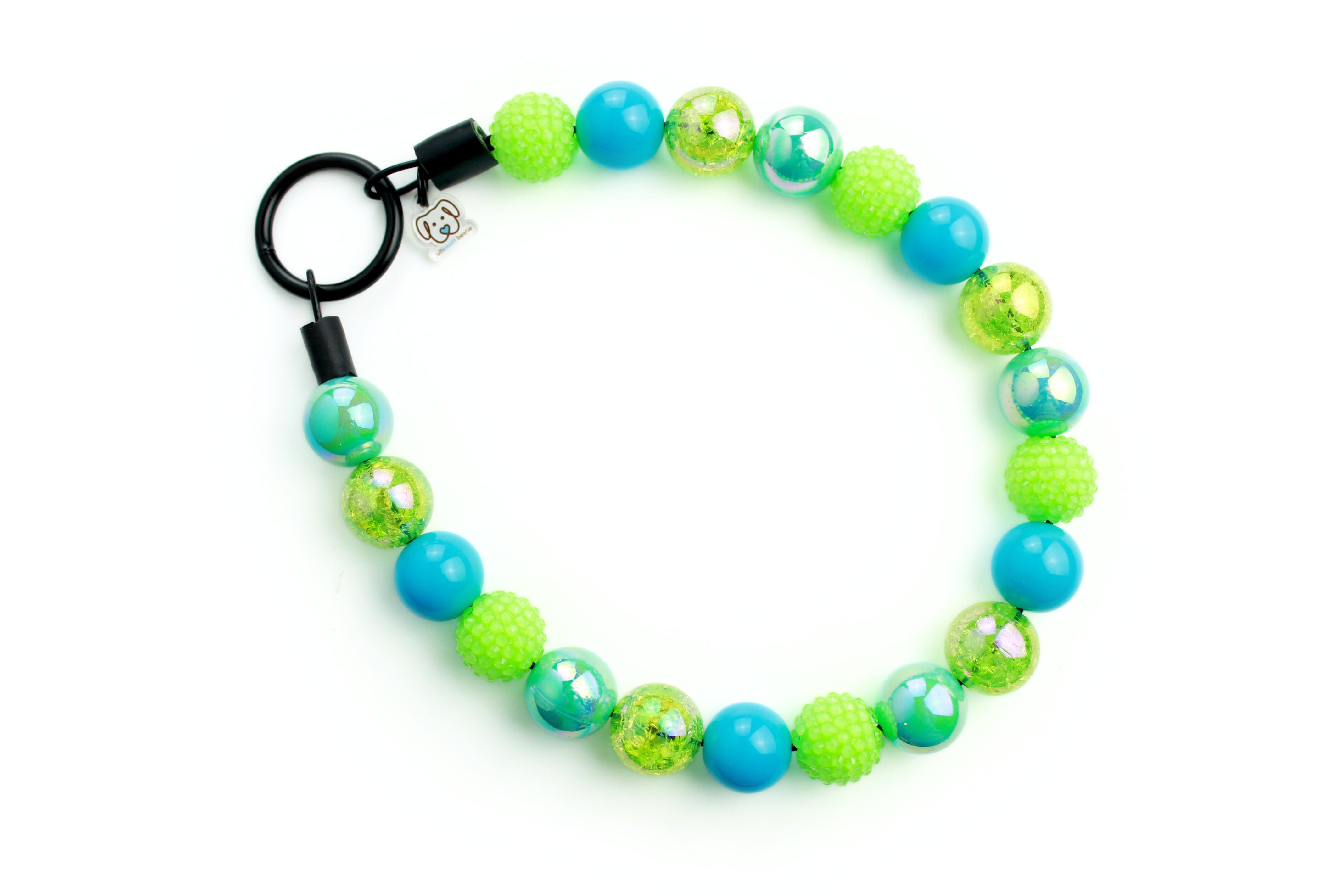 Dog beaded collar neon green and bright blues.