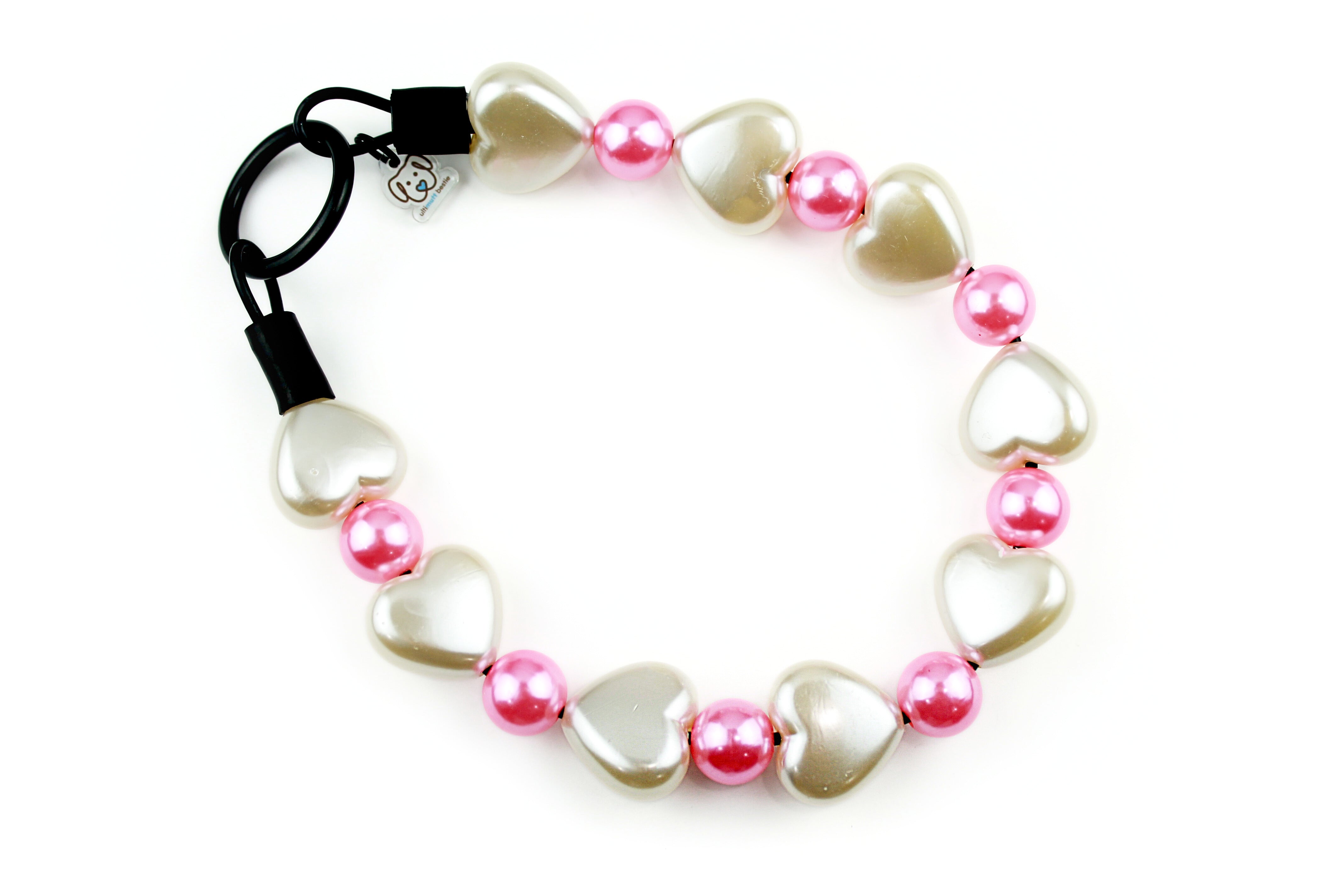 Large 23mm Puffy Acrylic Pearl Cream Hearts and 16mm small pink pearl beads with a black o-ring closure. Slip on Style