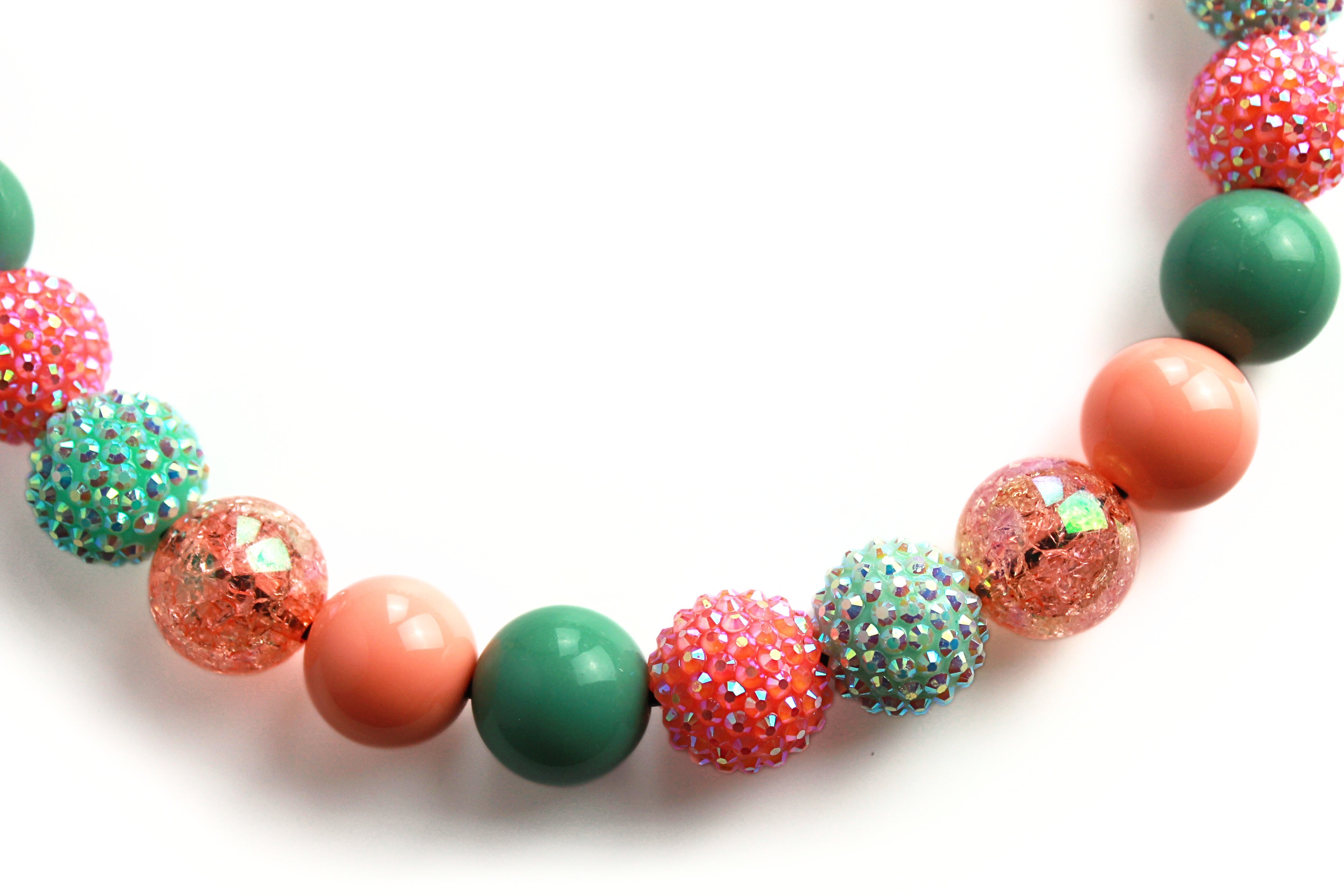 close up of the peach and seafoam beads