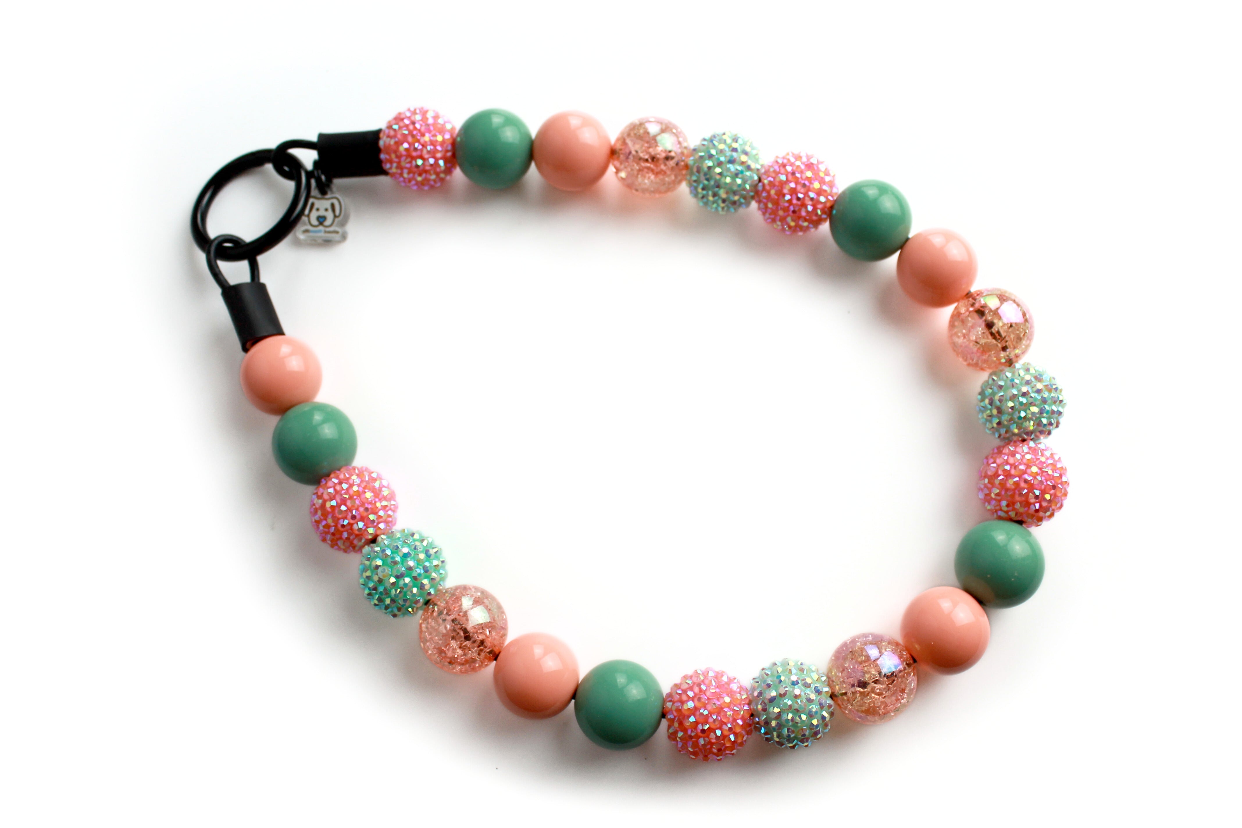 large bead dog collar in peach and seaform green with an black o ring closure